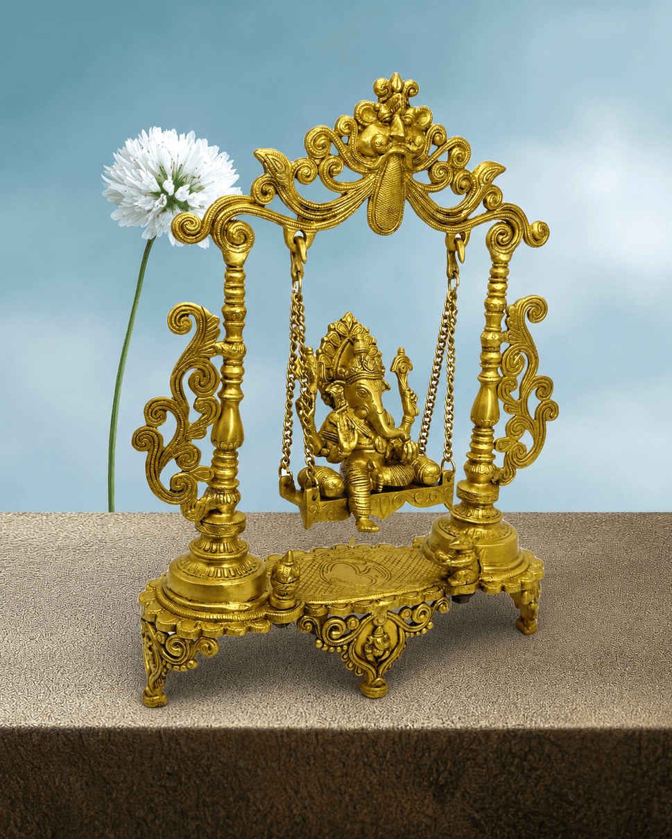 Brass Lord Ganesha seated on a Jhula ( swing )