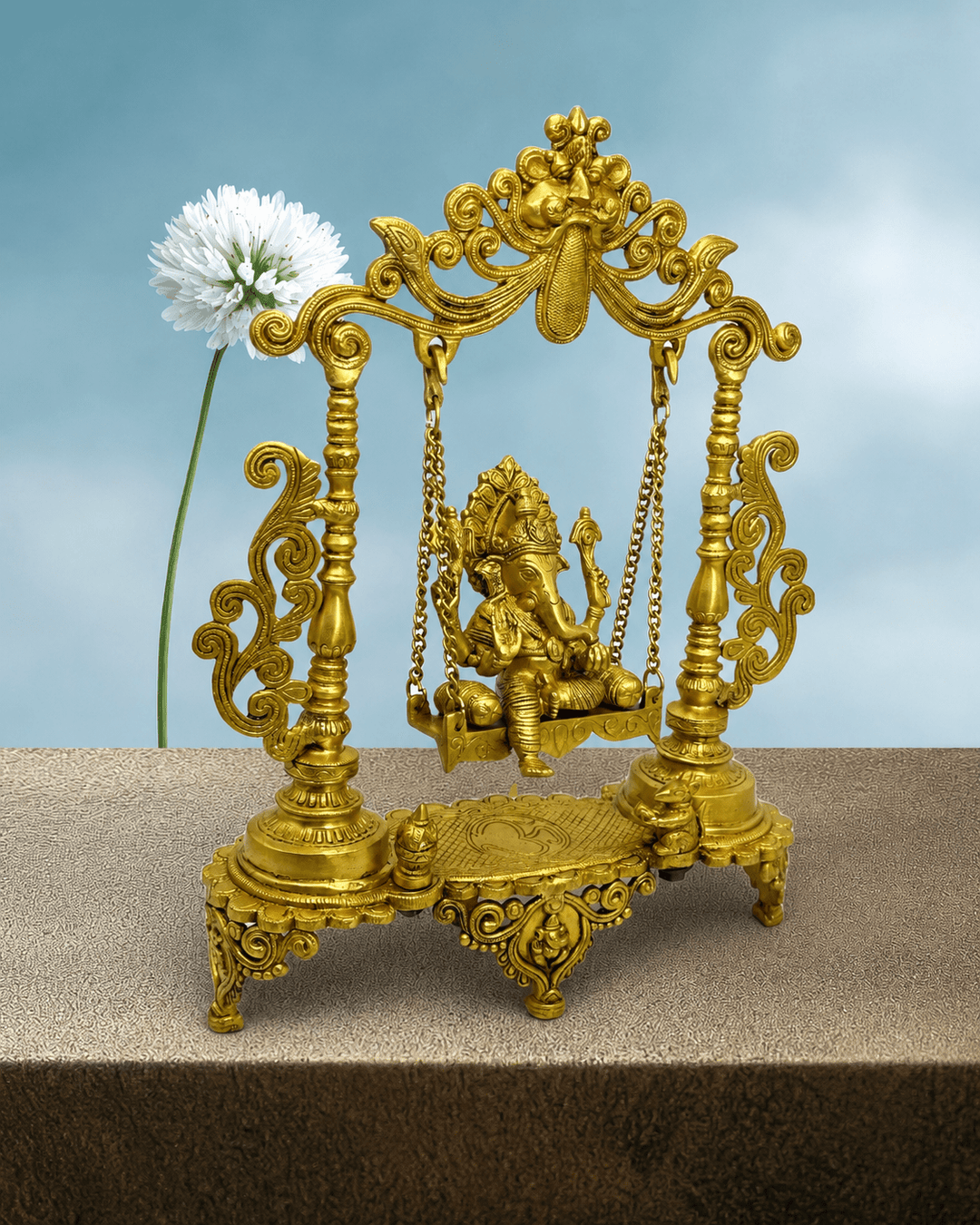 Brass Lord Ganesha seated on a Jhula ( swing )