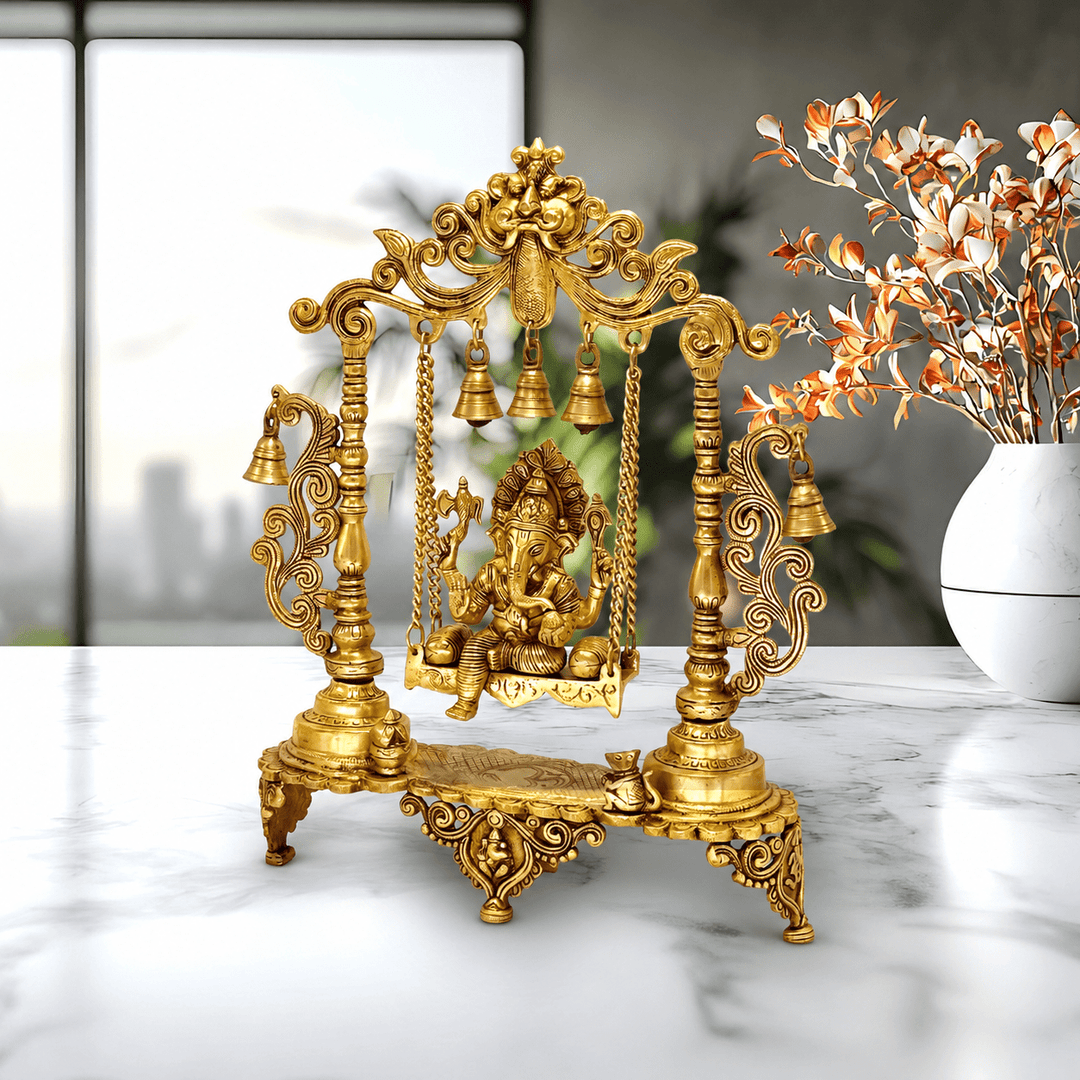 Brass Lord Ganesha seated on a Jhula ( swing )