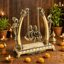Switch handmade brass Radha Krishna swing UAE, handcrafted brass Radha Krishna jhula Dubai, solid brass Radha Krishna swing sharjah, brass Radha Krishna idol on swing Abu Dhabi,  1 image