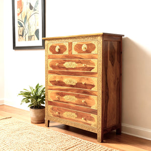 Wooden antique chest of drawer with decorative brass