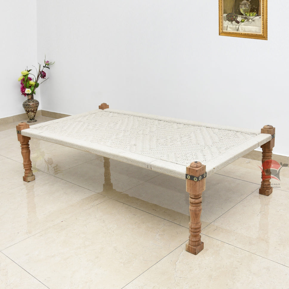 Wooden charpai with white cotton weaving with wooden frame