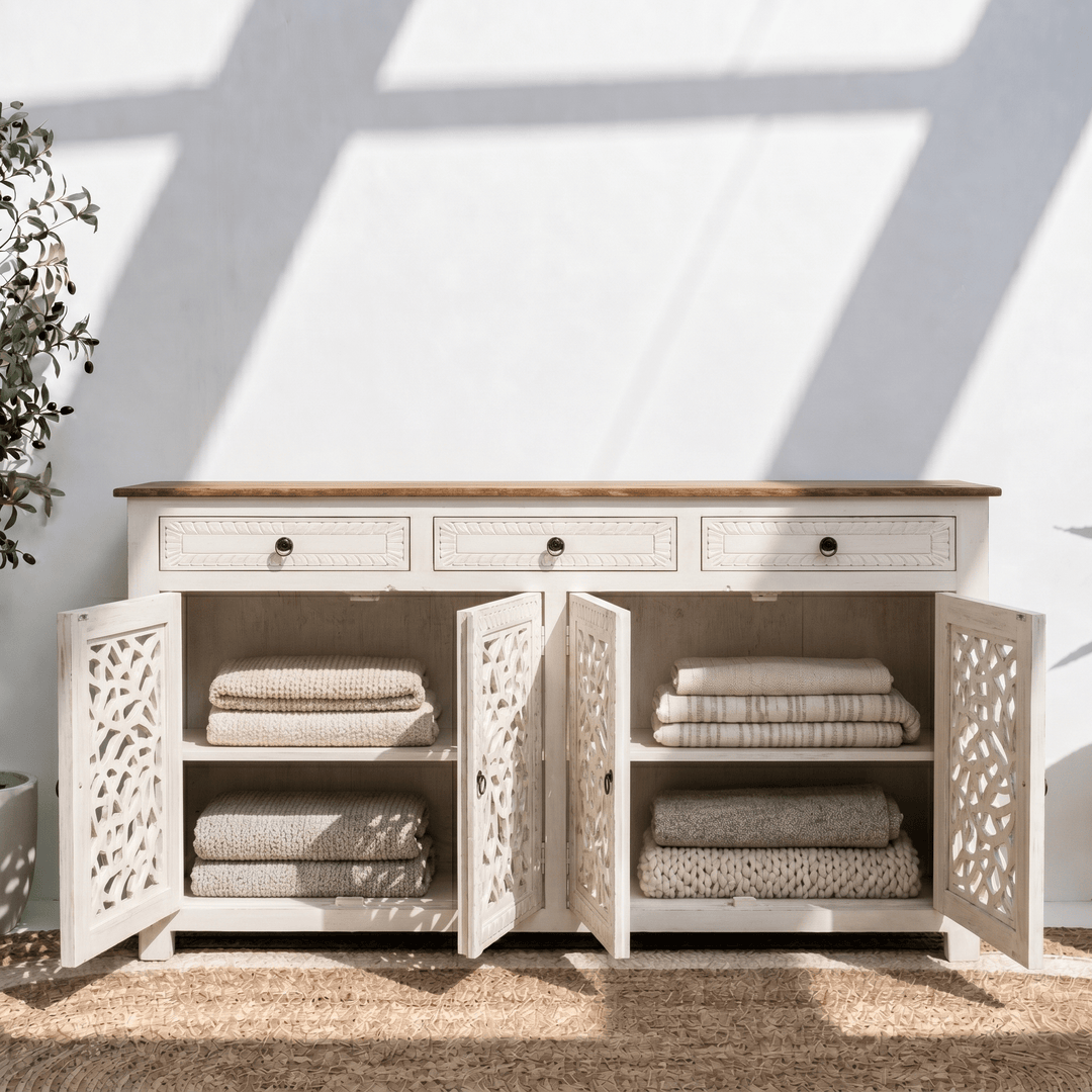 Elegant white wooden storage cabinet with decorative cutwork